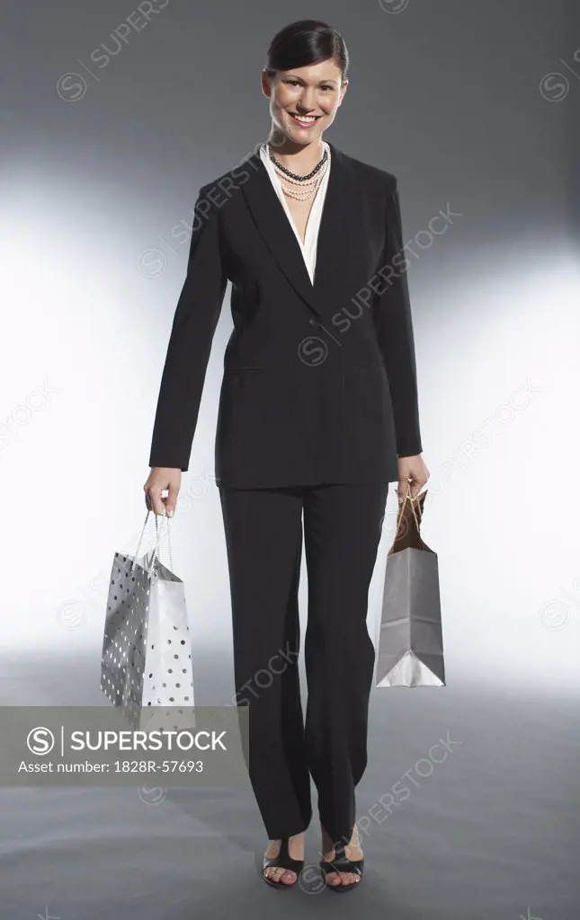 Woman Carrying Shopping Bags   