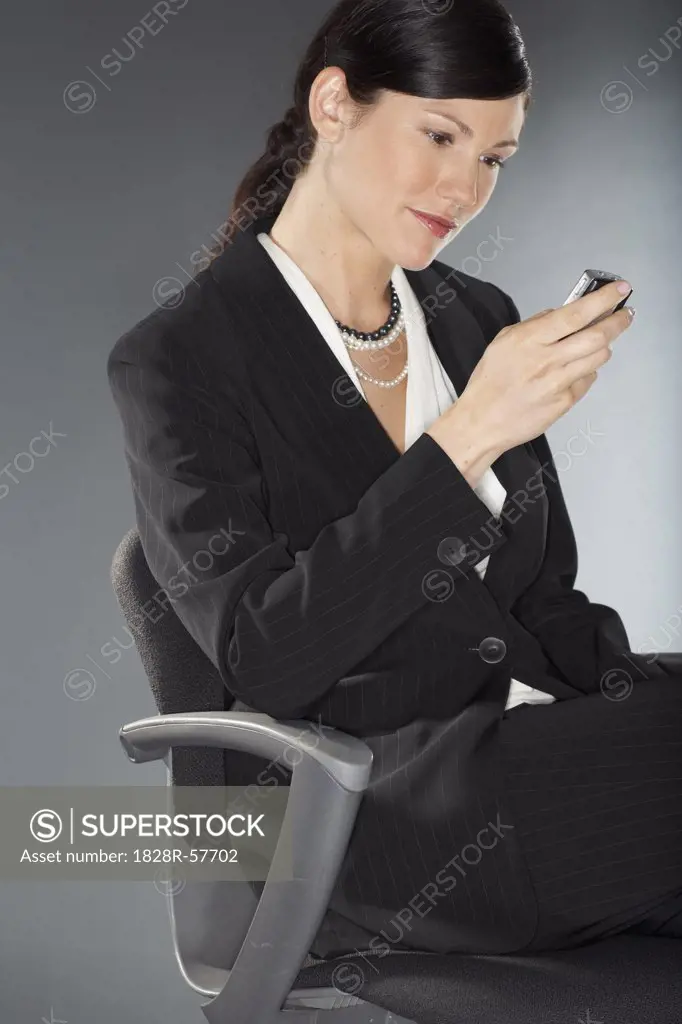 Businesswoman Reading Text Message   