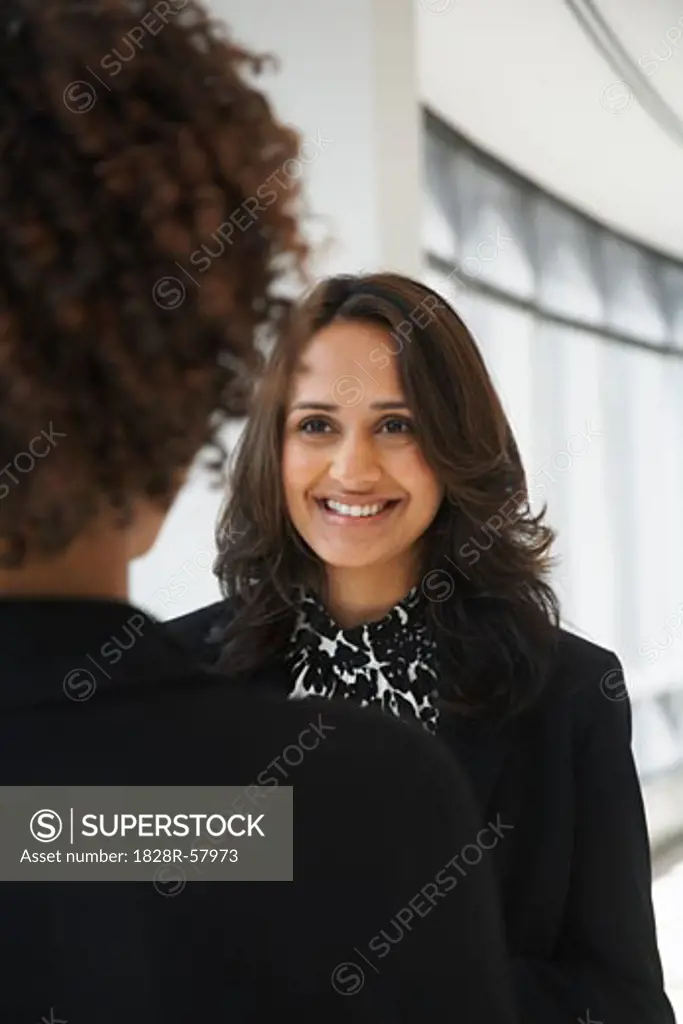 Businesswomen Looking at Each Other   