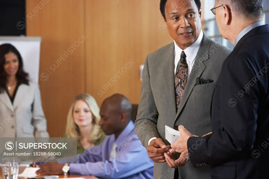 Business People in Boardroom   