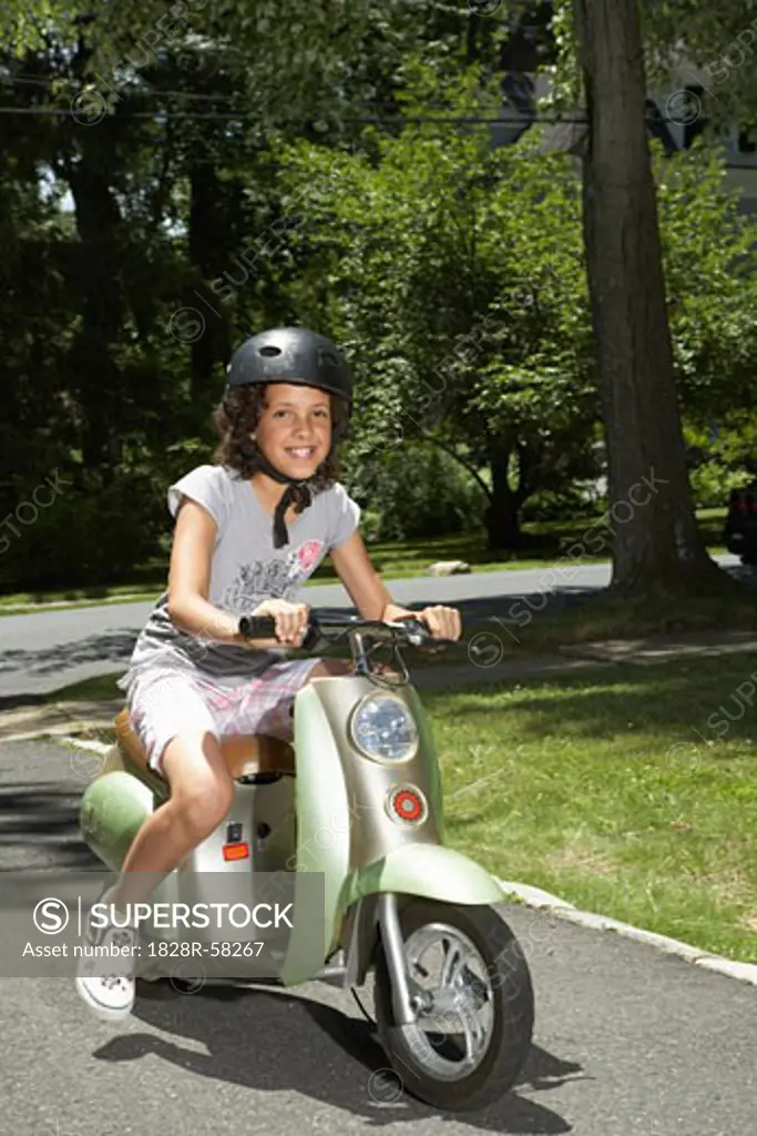Girl Riding Scooter   