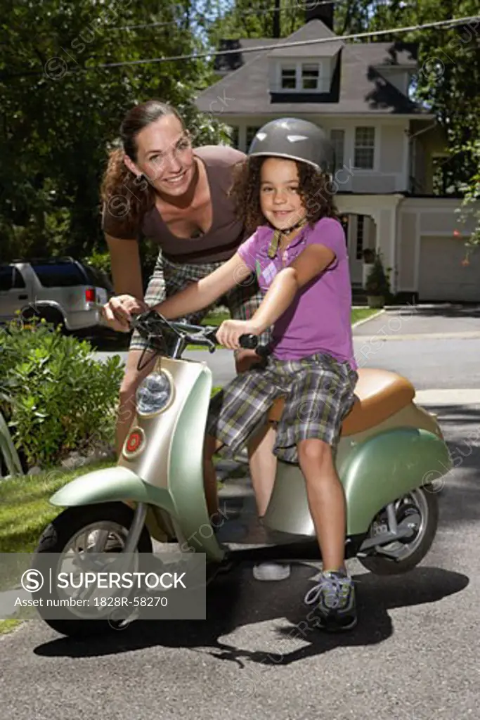 Portrait of Mother and Daughter with Scooter   