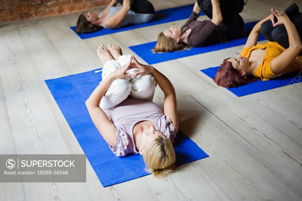 Women in Yoga Class   