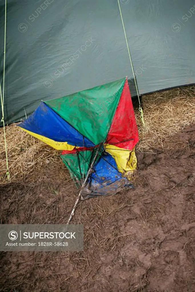 Broken Umbrella by Tent at Glastonbury Festival, South West England, England   