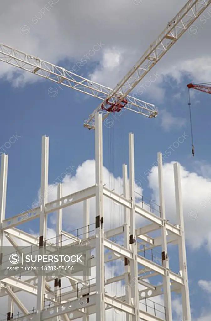 Cranes and Frame of Building at Construction Site   