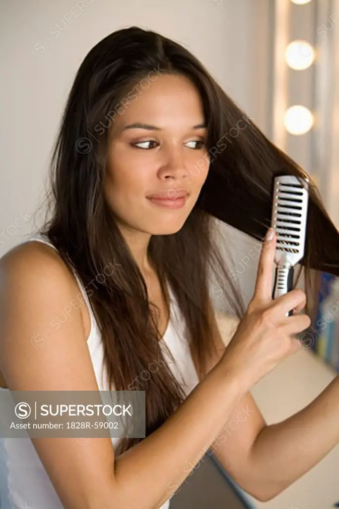 Woman Brushing Her Hair   