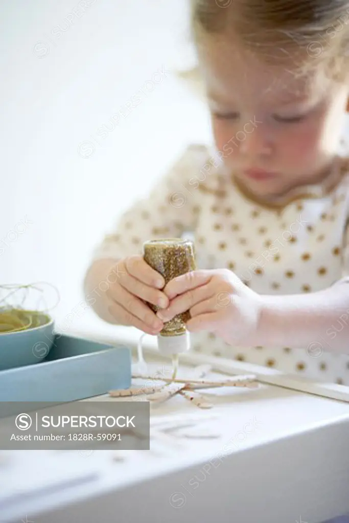 Little Girl Doing Arts and Crafts   