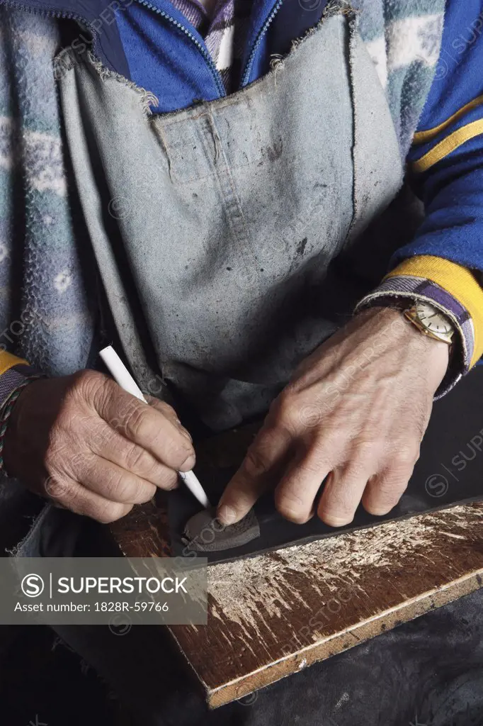 Close-up of Italian Shoemaker Making a New Heel   