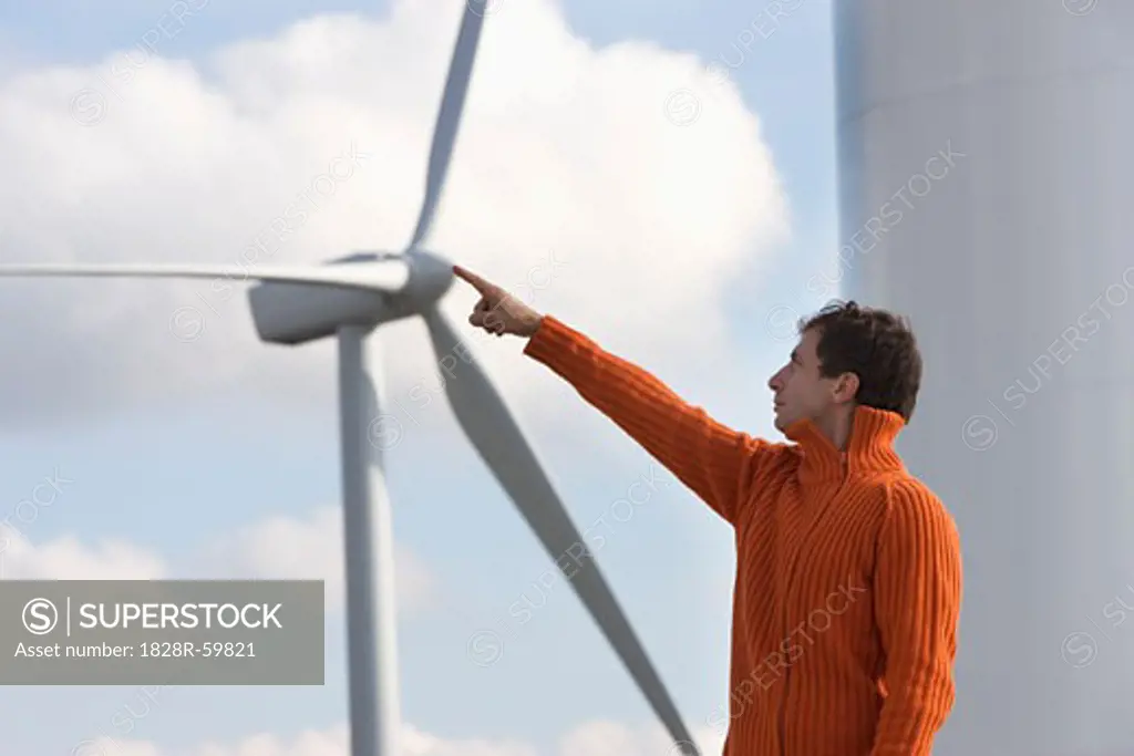 Man and Wind Turbine   