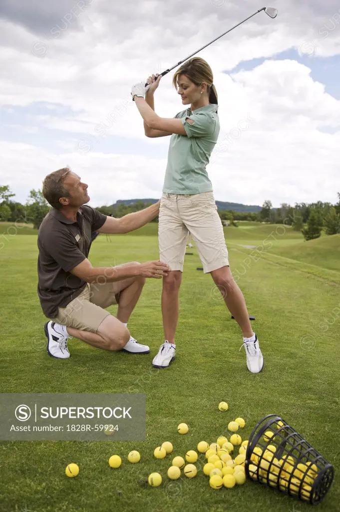 Woman Learning How to Golf, Burlington, Ontario, Canada   