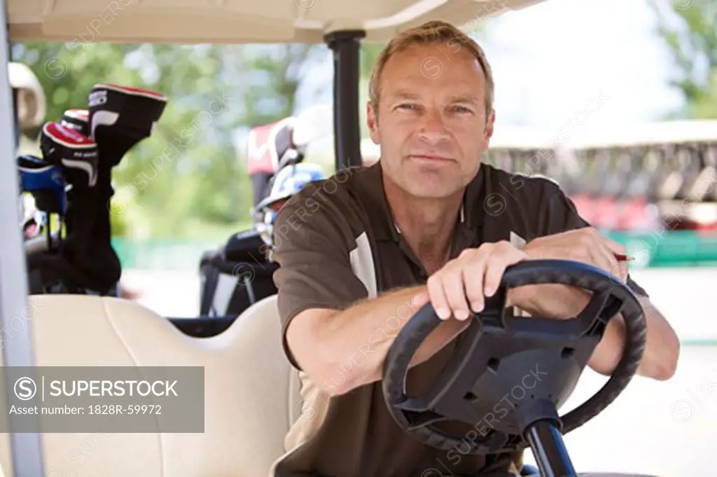 Portrait of Man in Golf Cart   