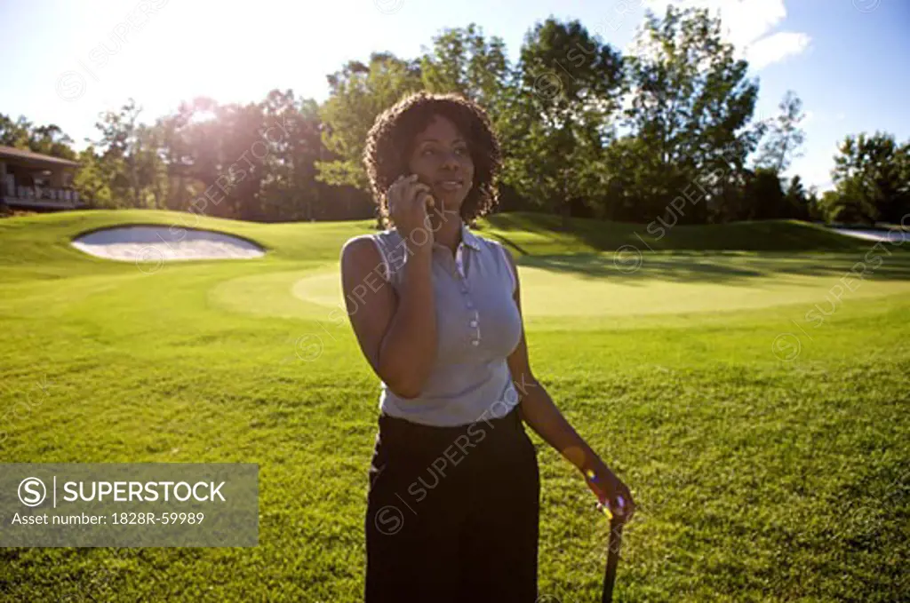 Golfer with Cellular Phone, Burlington, Ontario, Canada   