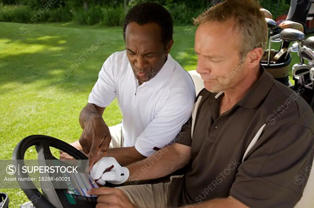 Golfers in Golf Cart with Scorecard, Burlington, Ontario, Canada   