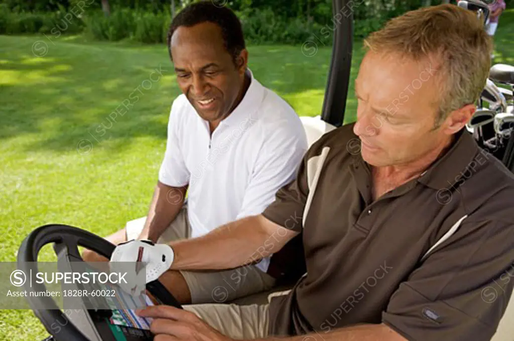 Golfers in Golf Cart with Scorecard, Burlington, Ontario, Canada   