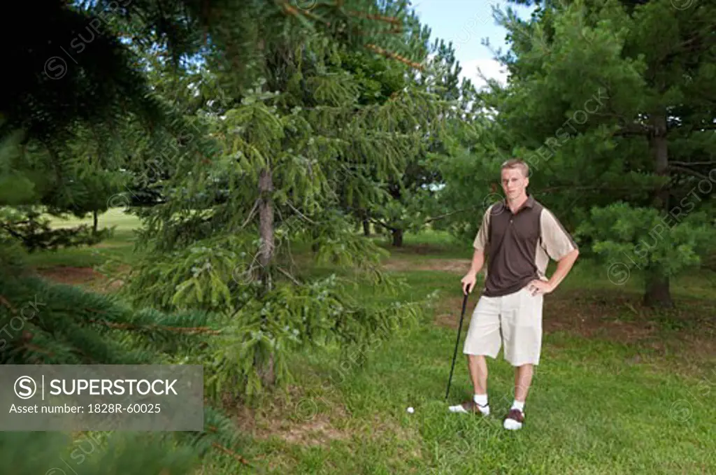 Man with Golf Ball in Rough, Burlington, Ontario, Canada   