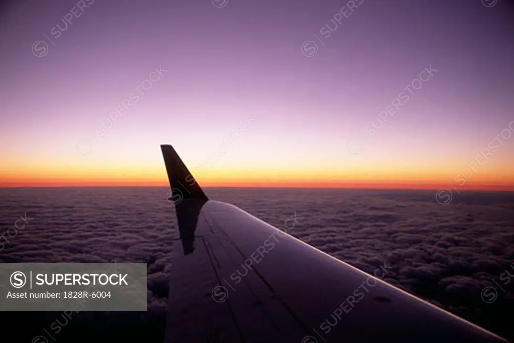 Airplane Wing and Sunset   