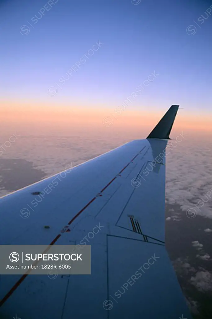 Airplane Wing and Sunset   