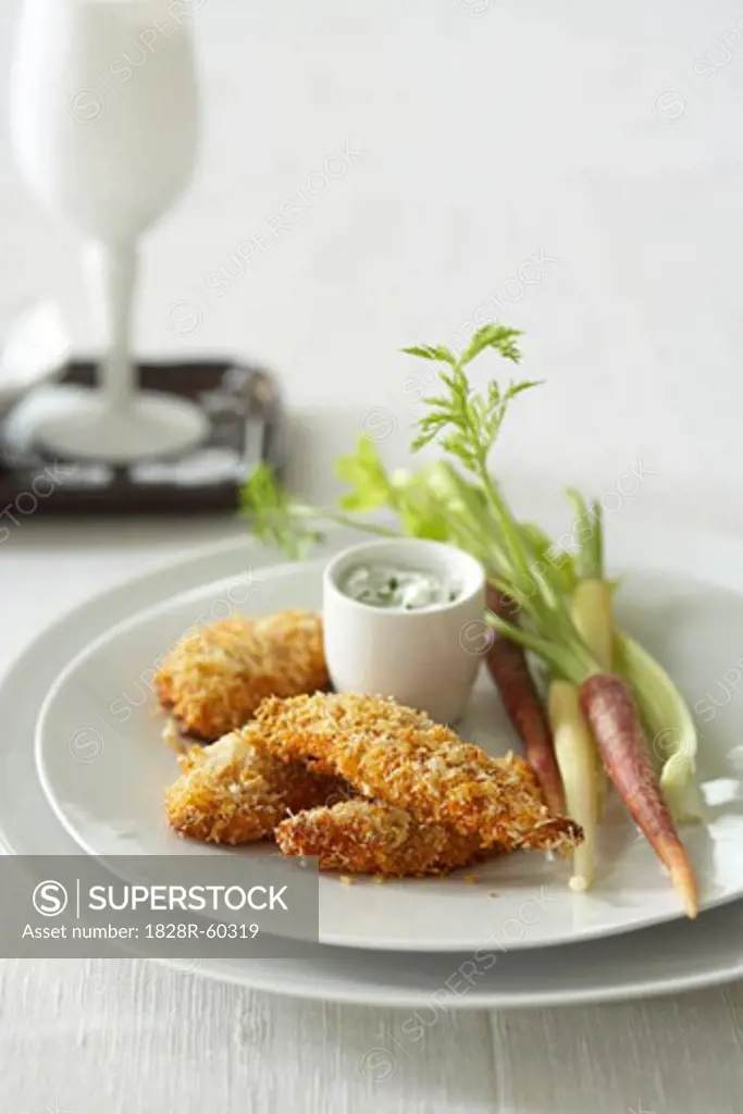 Coconut Crusted Chicken Fingers with Carrots and Celery and Dill Sourcream Dip   