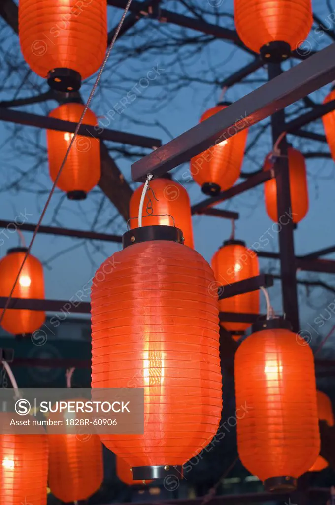 Red Lanterns Hanging Outside Restaurant at Night, Beijing, China   