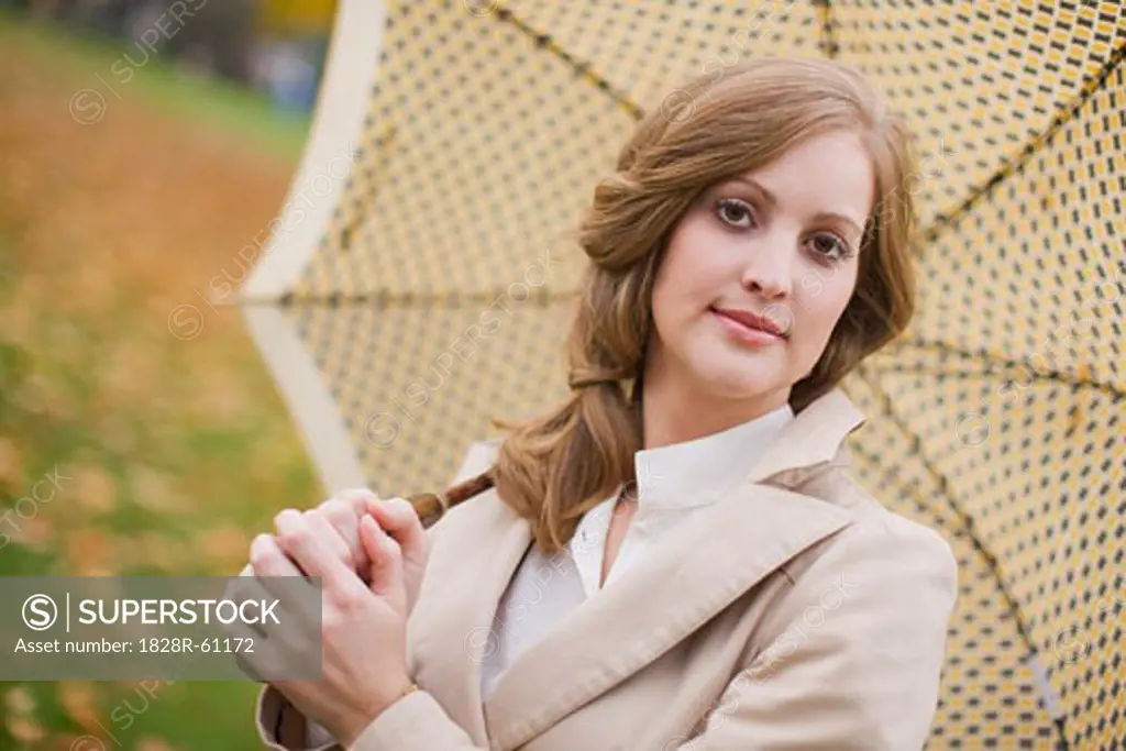 Portrait of Woman Holding an Umbrella, Portland, Oregon, USA   