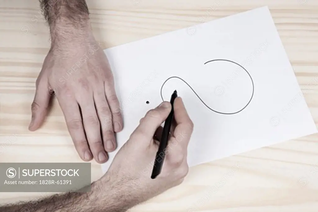Man Writing on Paper   