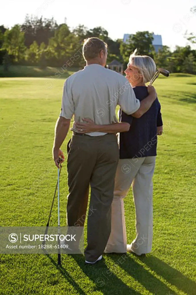 Couple on Golf Course, Burlington, Ontario, Canada   