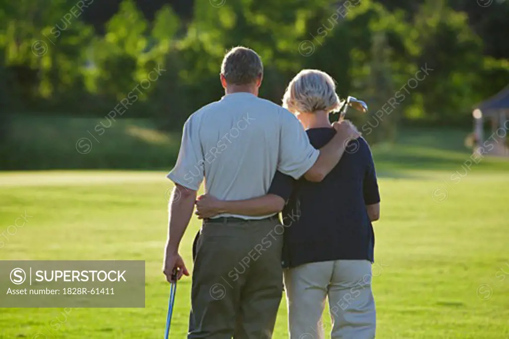 Couple on Golf Course, Burlington, Ontario, Canada   