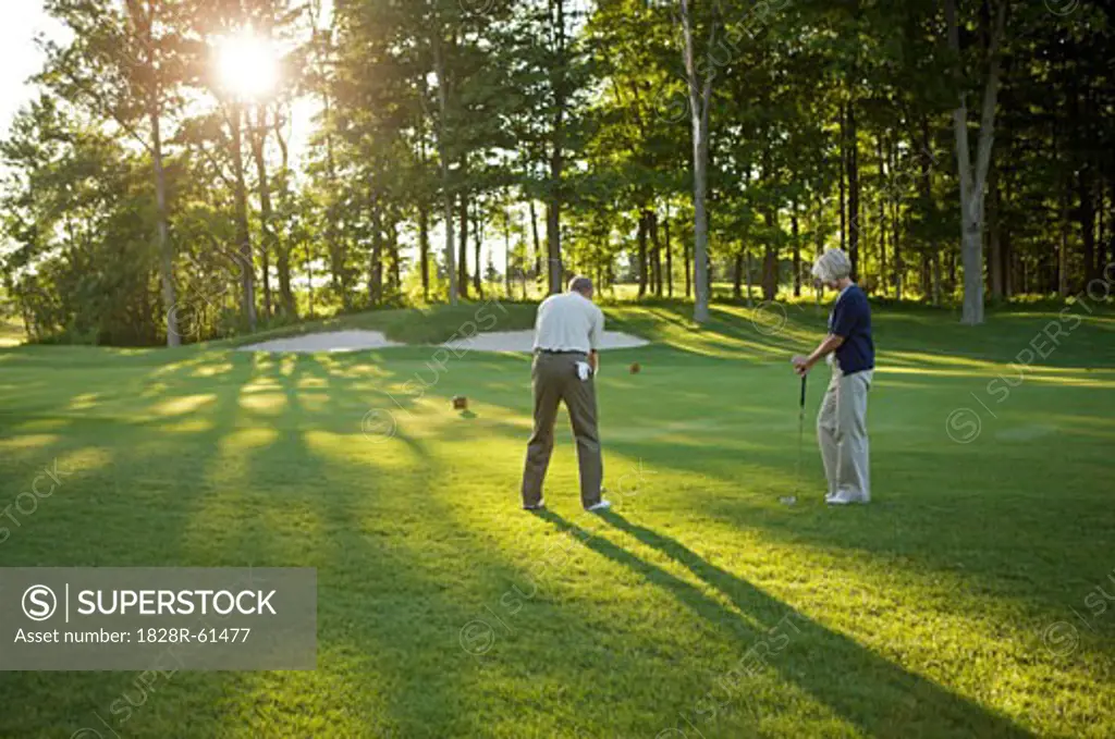 Couple Playing Golf, Burlington, Ontario, Canada   