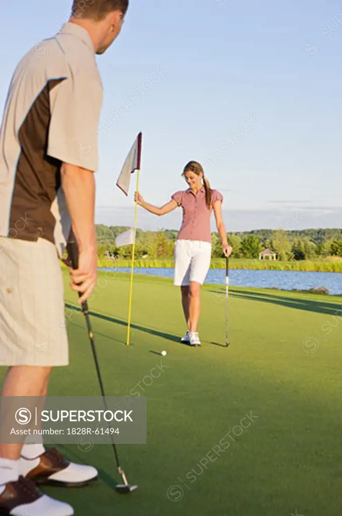 Couple Playing Golf, Burlington, Ontario, Canada