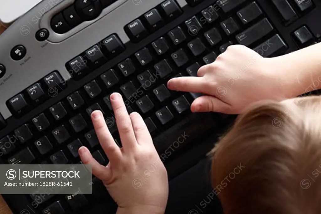Little Girl Typing   