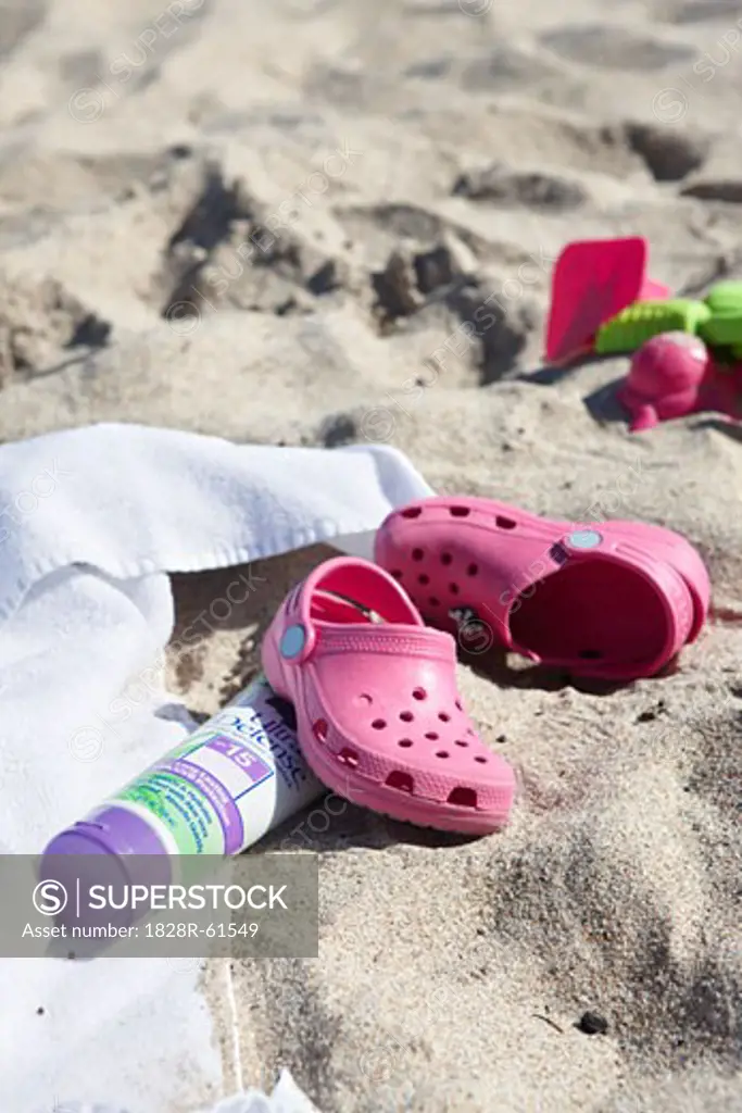 Shoes, Sunscreen and Towel on Beach, Fort Lauderdale, Florida, USA   