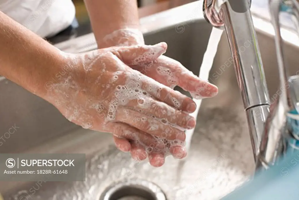 Man Washing his Hands