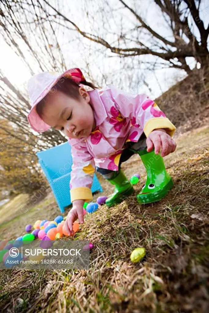 Little Girl Searching for Easter Eggs in the Park, Bethesda, Maryland, USA   