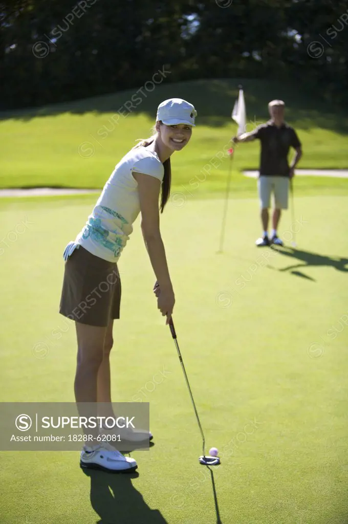 Couple Golfing   