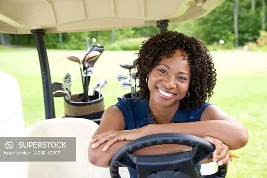 Portrait of Woman Sitting in Golf Cart