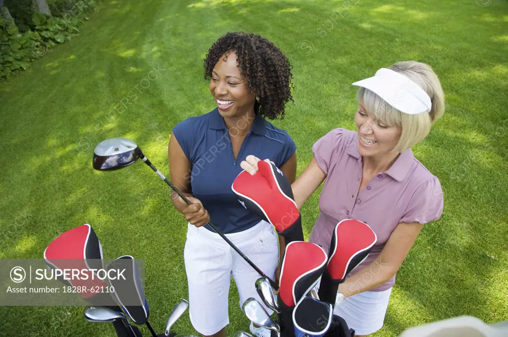 Women Choosing Golf Clubs