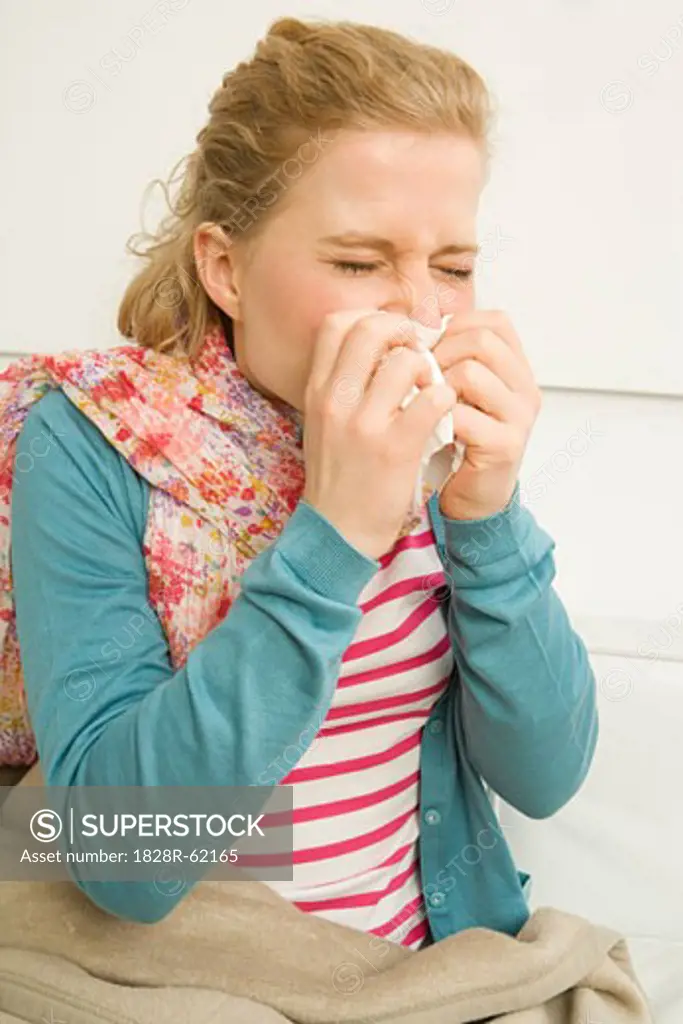 Woman Blowing Nose   