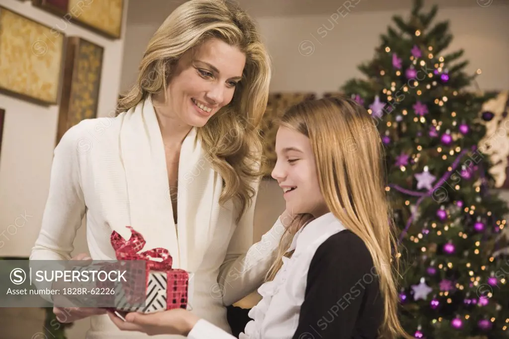 Mother Giving Daughter Christmas Gift   