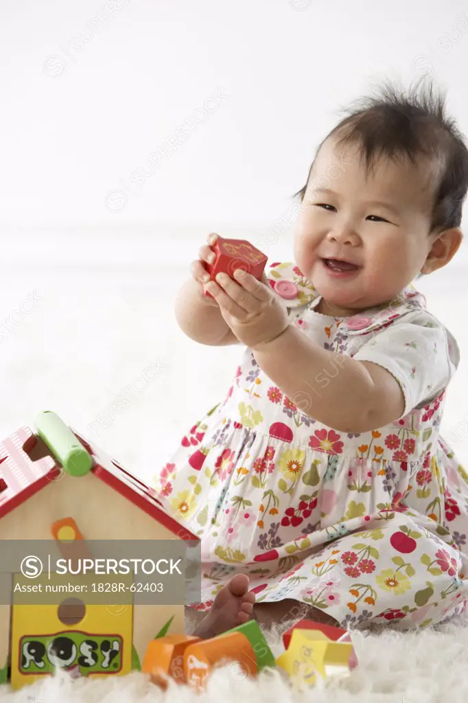 Girl Playing with Shapes and House   