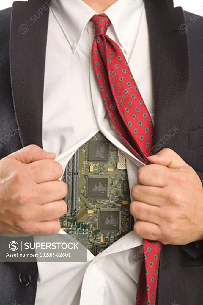 Businessman Opening Shirt to Reveal a Computer Motherboard