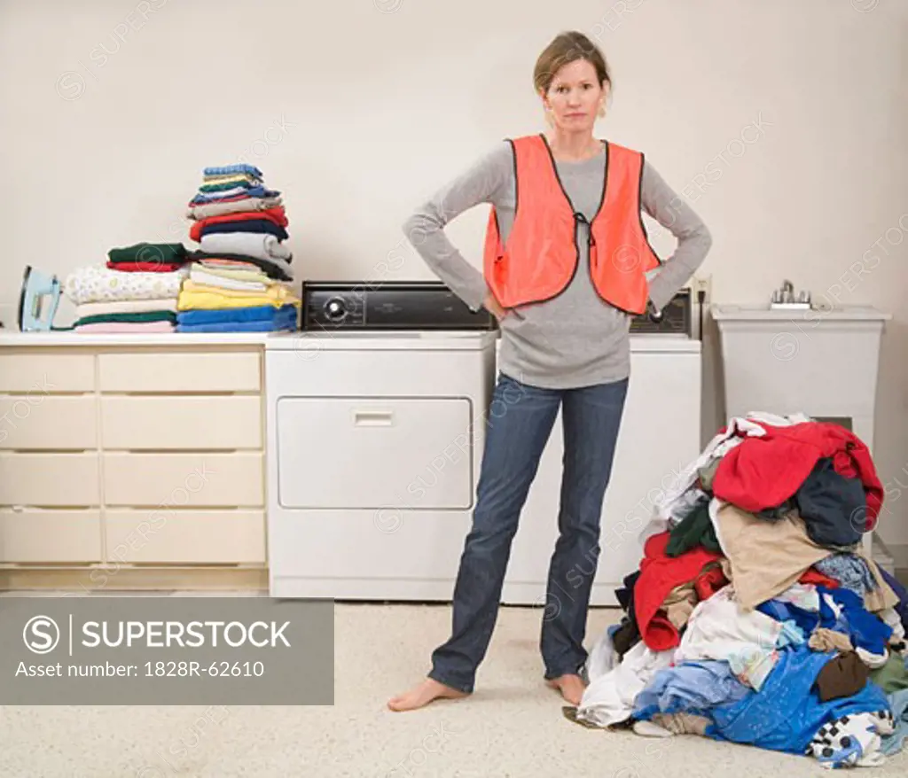 Woman Wearing Safety Vest Doing the Laundry