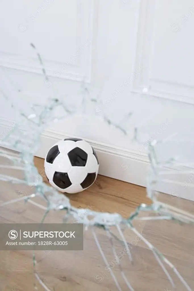Soccer Ball and Broken Window