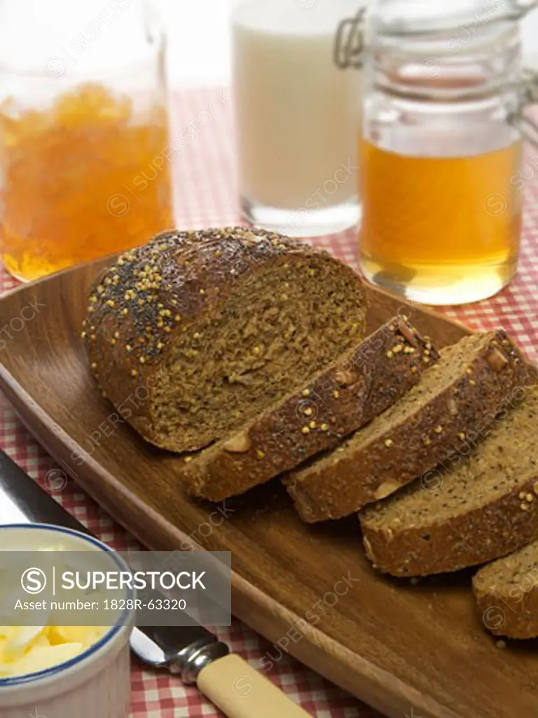 Whole Grain Bread With Honey, Milk, Marmelade and Butter