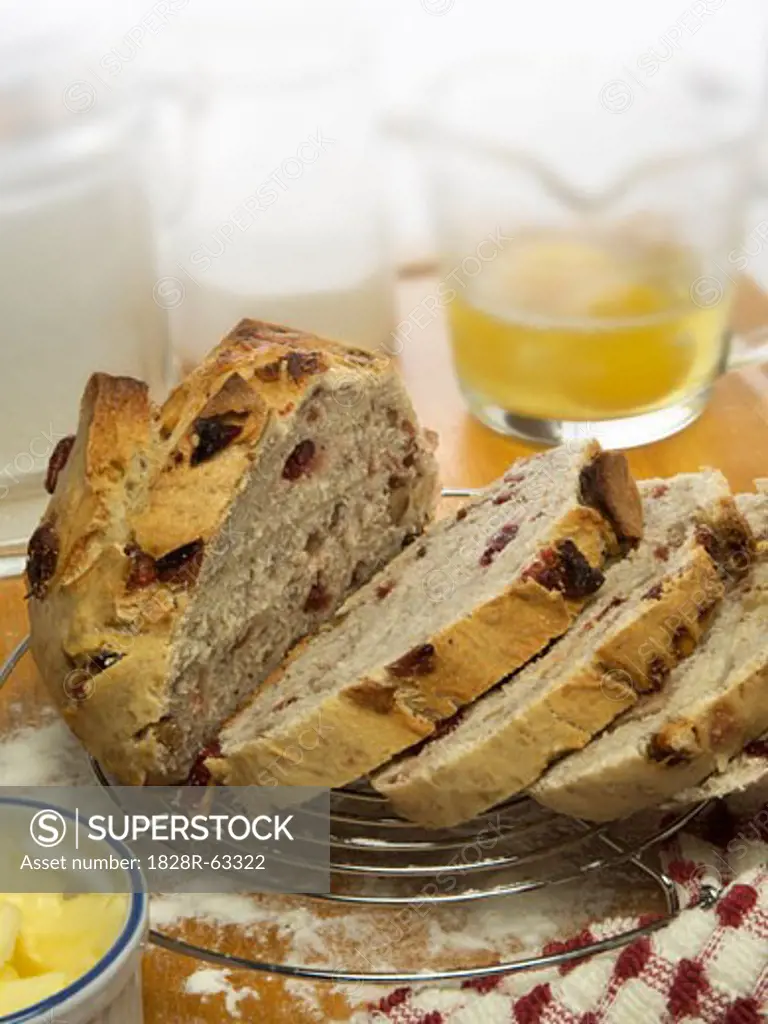 Cranberry Bread on Cooling Rack With Baking Ingredients