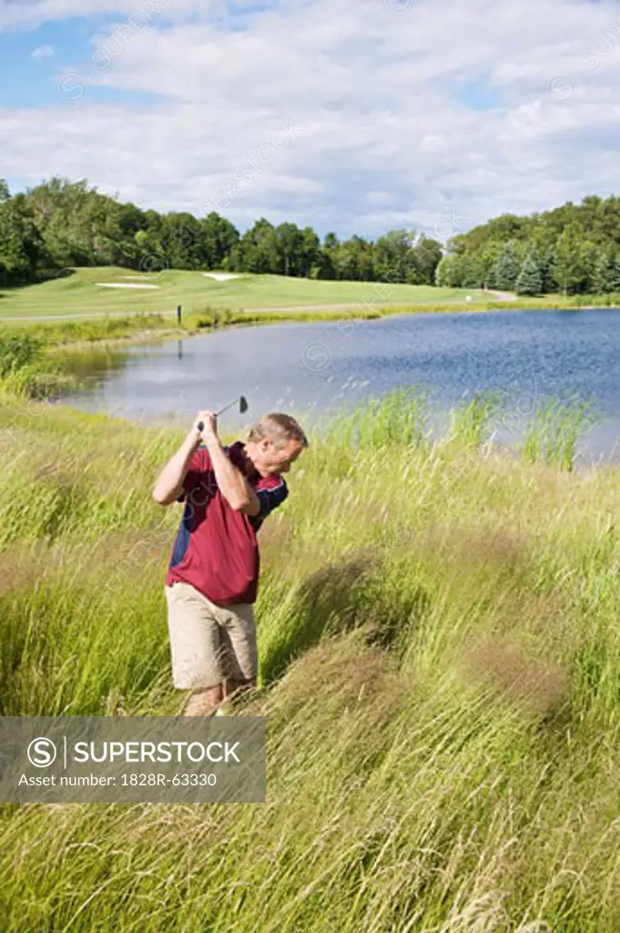 Man Golfing in Tall Grass
