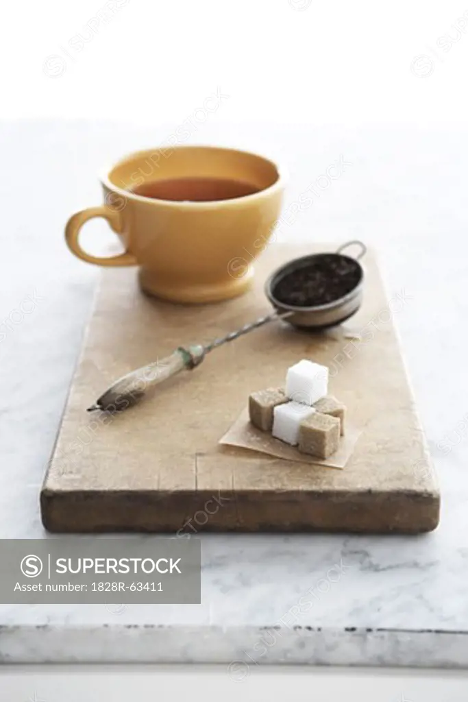 Tea Cup and Tea Strainer