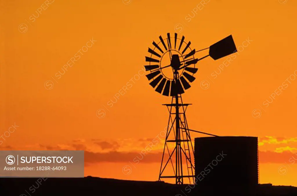 Windmill, Water Tank, Sunset Silhouette