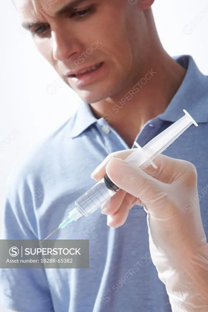 Scared Patient Looking at Needle