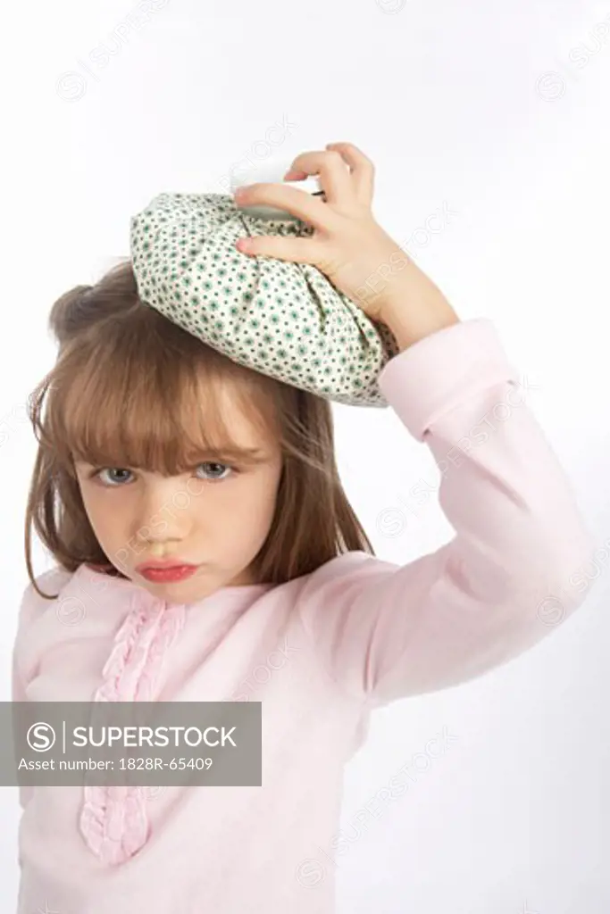 Girl Holding an Ice Pack on Her Head