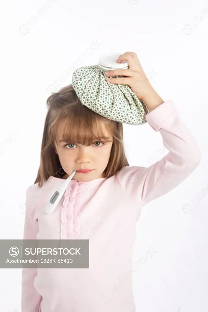 Girl With a Thermometer in Her Mouth and an Ice Pack on Her Head